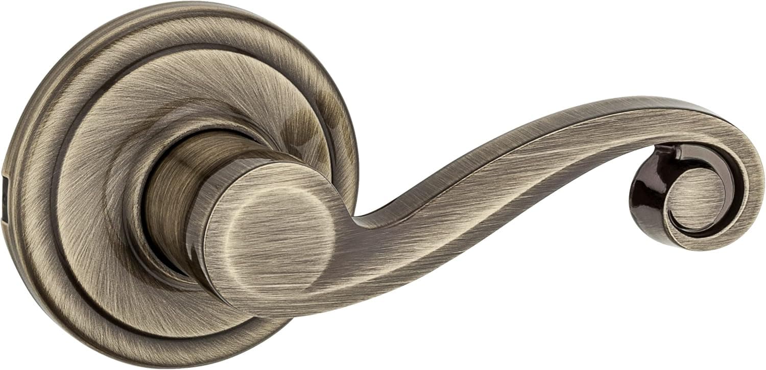 Kwikset Lido Hall/Closet Lever with Microban Antimicrobial Protection in Antique Brass