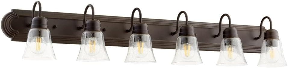 Quorum International 5094-6-286 | 6 Light Transitional Metal Damp Rated Bath Vanity in Oiled Bronze Finish with a Clear Seeded Bell Shaped Glass Shade | Easy to Install for a Modern and Classic Style
