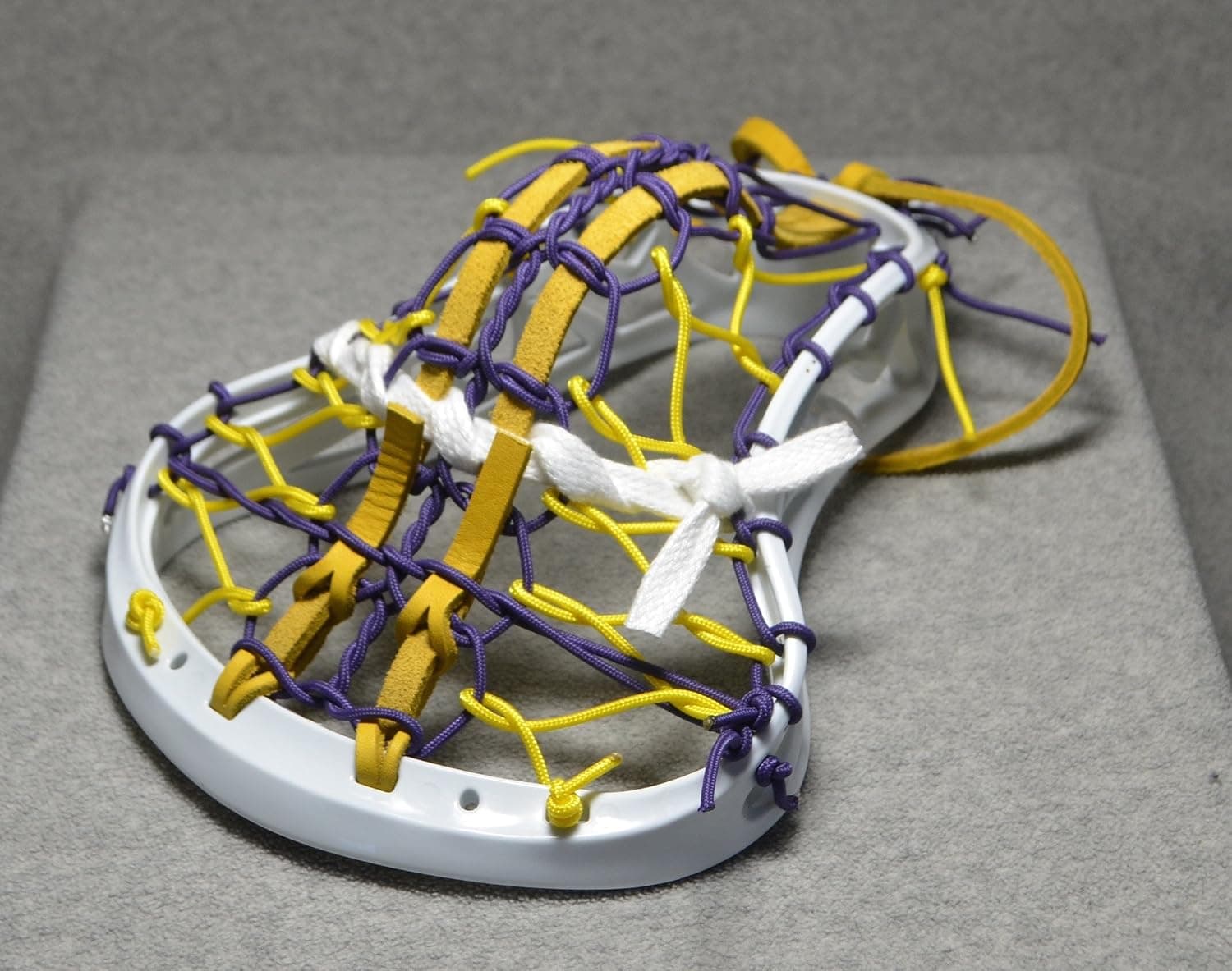Blackfeet Lacrosse Big Dog Inspired by Albany U Mini Stick Traditional Strung Pita Pocket Yellow Leathers - White Head with Purple Finish Handle