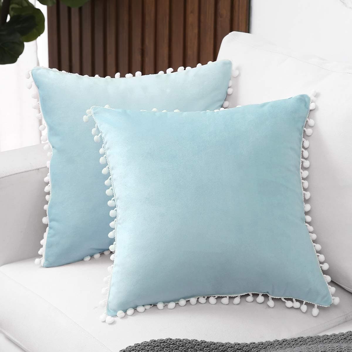 MUDILY Pack of 2 Velvet Decorative Throw Pillow Covers with Pom Poms Pillowcases Solid Soft Square Poms Cushion Covers Modern Decor for Couch Sofa Bedroom Car 16 x 16Inch 40 x 40cm Light Blue