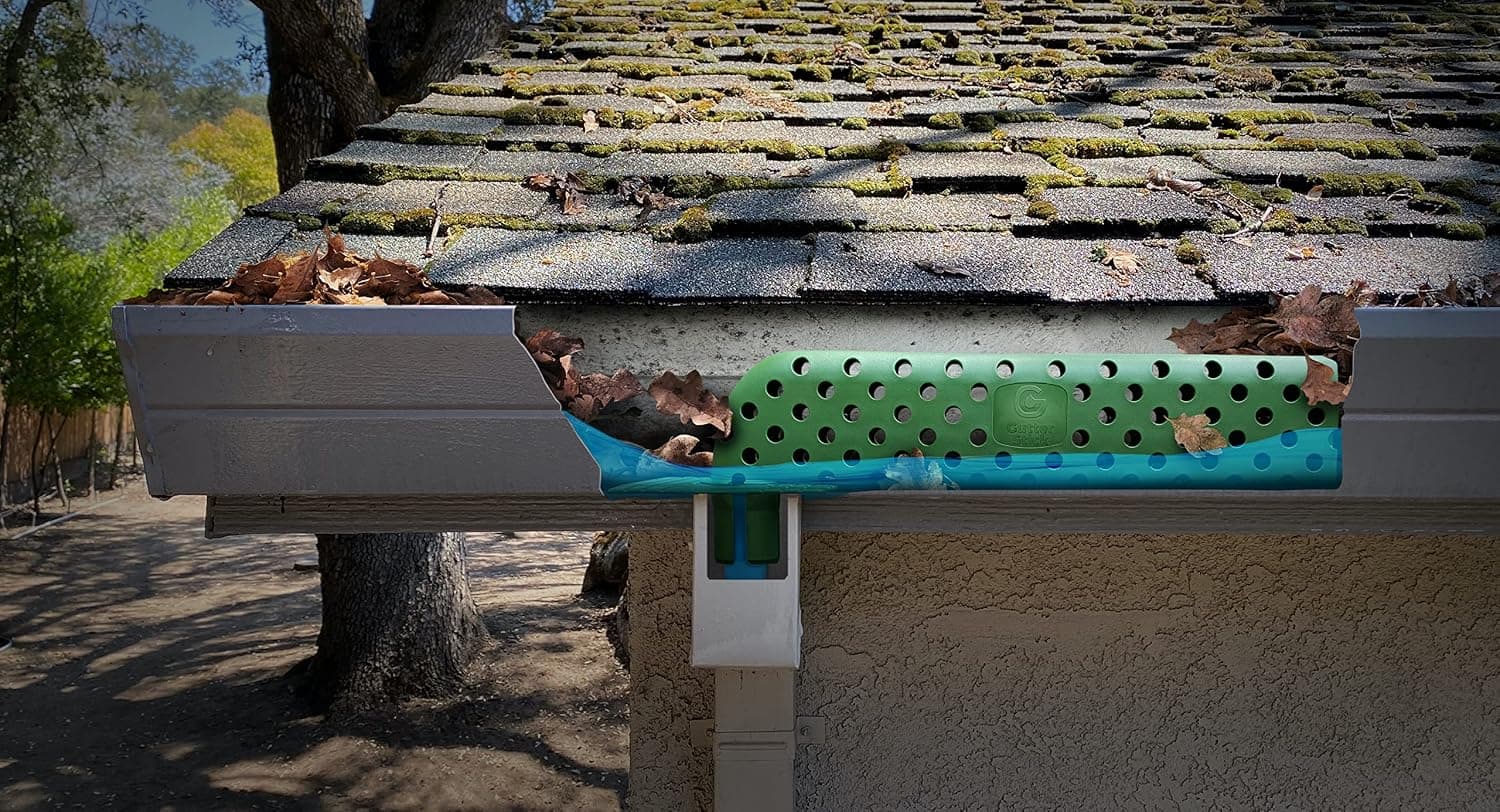 Gutter Stick® | Leaf filter gutter protection and gutter guard. Keeps water flowing out of gutters in between cleanings even with leaves and debris. Ridiculously easy DIY for year-long protection.